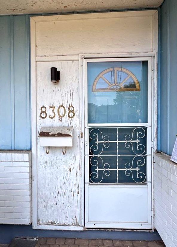 Before: old entry door exterior