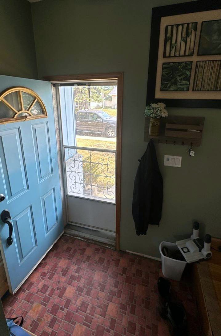 Before: weathered patio door