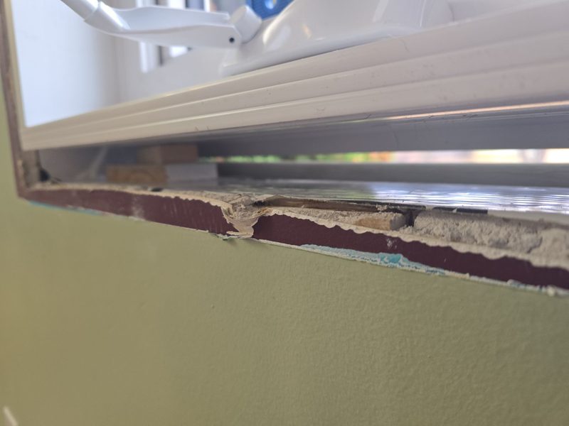 Shims placed precisely under window for perfect alignment