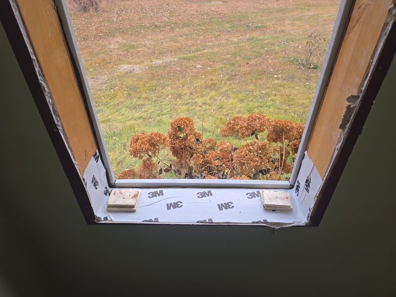 Sub-sill membrane flashing installed with proper slope for drainage