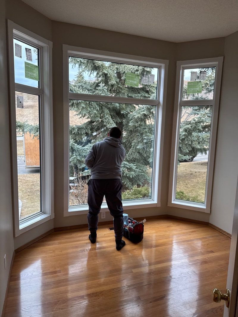 Installer working on window from inside