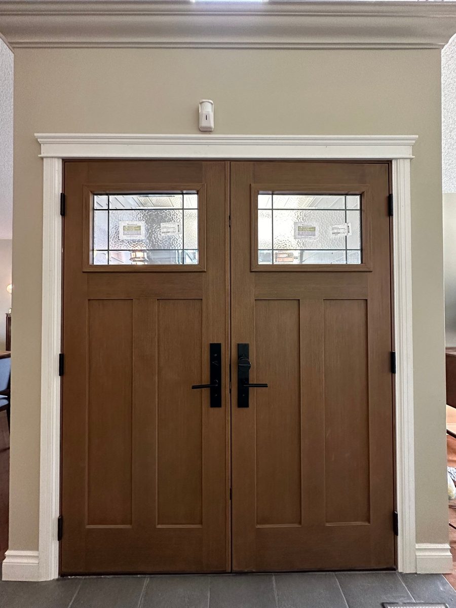 Double Mastergrain fiberglass entry doors with decorative glass