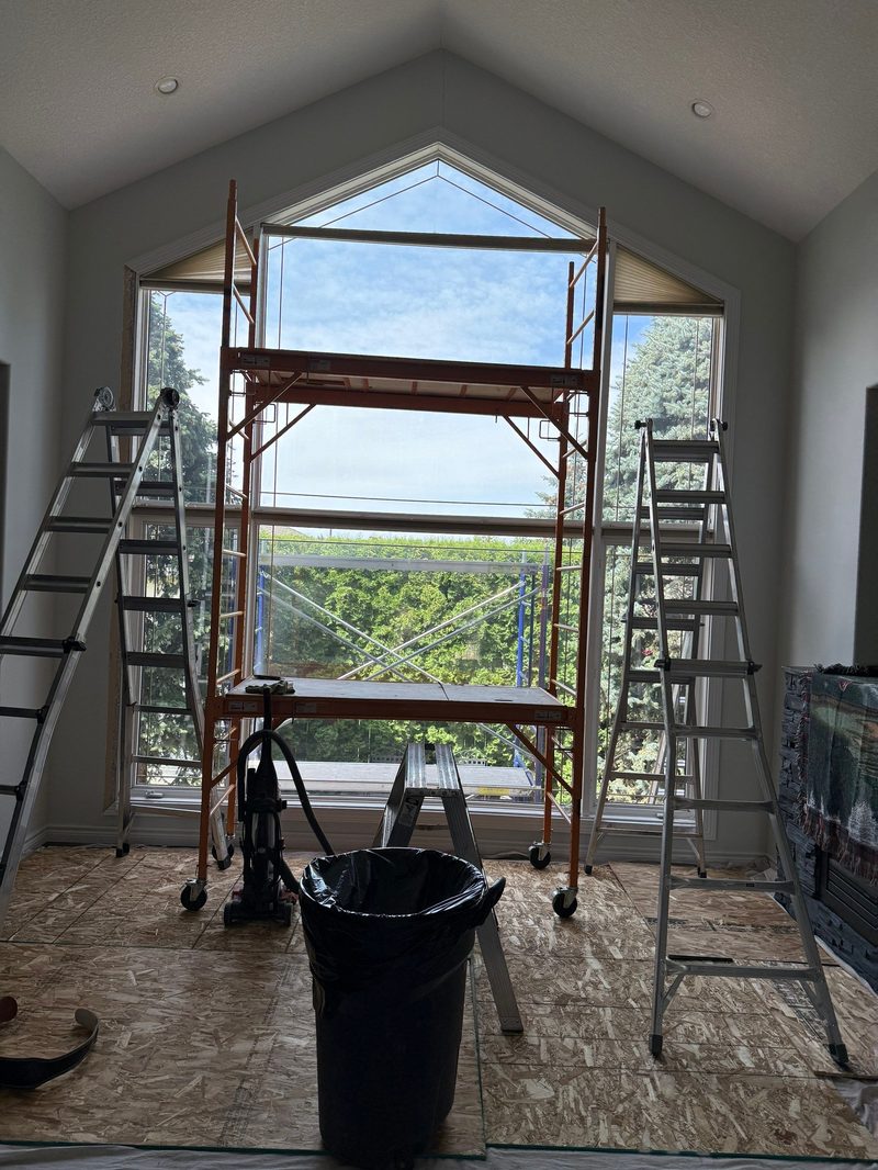 All drop cloths and protective coverings removed, clean floors ready for normal use